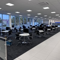 Aura executive medium back with 900mm diamter tops and brushed steel base